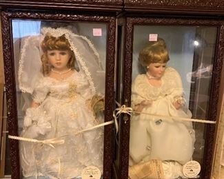 Large assortment of porcelain dolls