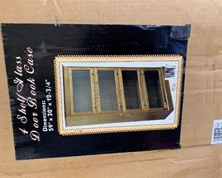 Ready to assemble 4 shelf, glass door bookcase