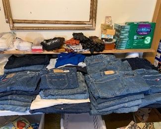 Men’s and ladies denim jeans, some still with tags