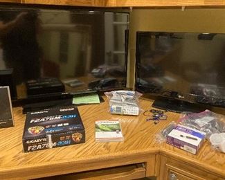 Flat screen televisions and computer accessories.
