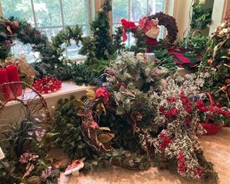 Tons of Christmas decorations, floral and greenery