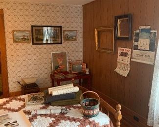Eagle bedroom 
Local vintage calendars, quilt, posters, vintage orange TV, wool blankets, wagon light
