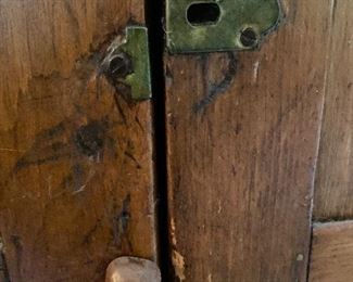 antique hardware on cupboard