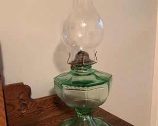 Green glass oil lamp available on sale day