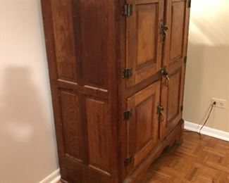 antique oak ice box converted to bar cabinet