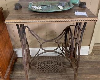 Antique sewing machine base with removable decor tray. 