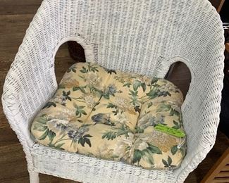 White wicker chair with cushion 
