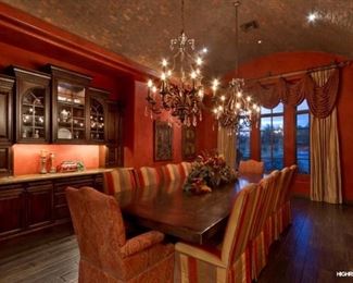 Estate Sale size Dining Room table has 12 chairs. This gorgeous table was custom made. It is all one piece, there are NO leaves on this beautiful piece. Table is 12 feet long x 5 feet wide. Scrolled iron base. Check back soon for a picture of the base. 