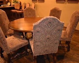 Round table and 6 chairs. Table is 60 inches round. 