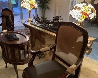 Cowhide Chairs and Tiffany Designed Lamps