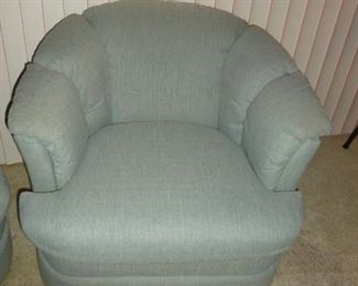 One of 2 swivel barrel chairs