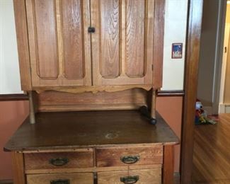 Antique possum belly bakers cabinet