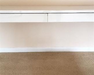 Long narrow "desk" has two drawers