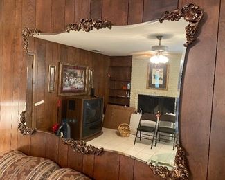 Fabulous large mirror with beautiful scrolled work corners $250.00
