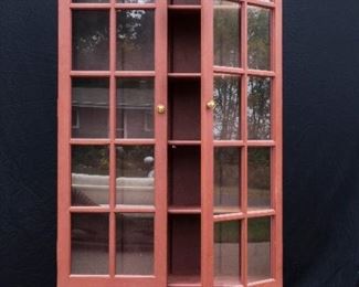 Rust colored Lawyer's Cabinet.