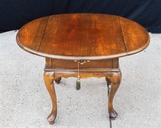  Drop Leaf oval end table.