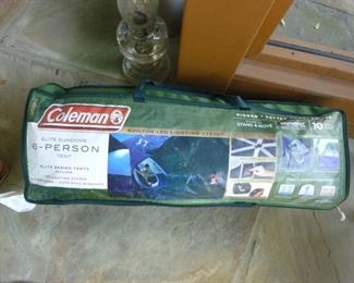 6 person Coleman Elite Series tent with lighting, hinged doors and roll up windows...used one time!