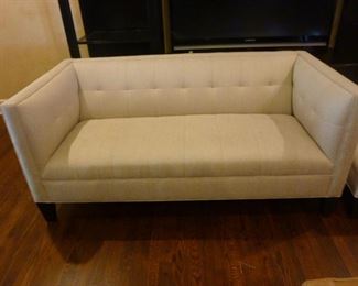 Amazing contemporary sofa from Mitchell Gold & Bob Williams. Has a small matching ottoman.