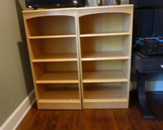 Two blond bookshelves