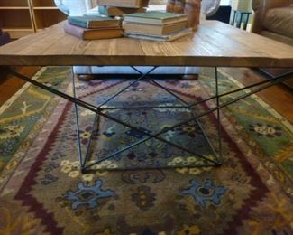 Iron base table with wood block top
