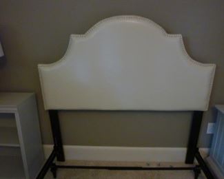 White upholstered (vinyl) with silver stud tacks