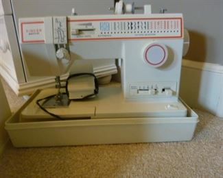 Singer "Merritt" Sewing machine, Model #4552, with carry cover