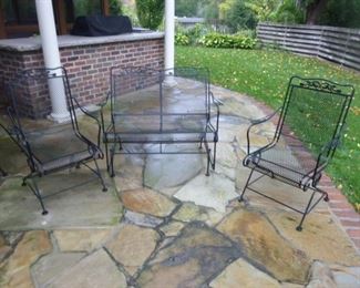 Pair of wrought iron rockers and a wrought iron glider