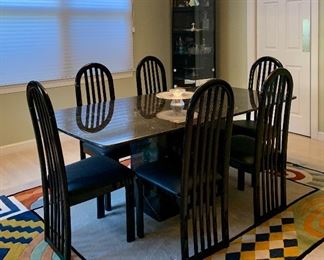 Item 1:  Black marble dining room table - 74"l x 29.5"w x 29"h:  $795