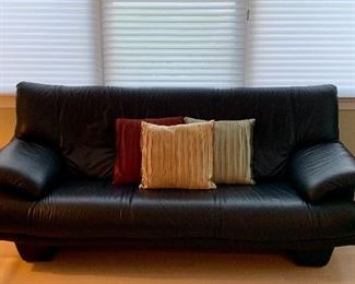 Item 42:  Natuzzi leather sofa (Made in Italy) - 82"l x 21"w x 34"h:  $795