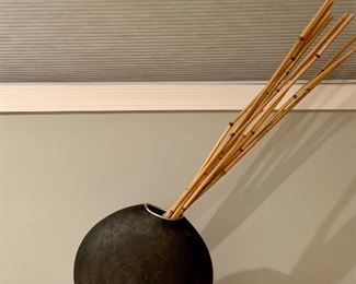 Item 115:  Black contemporary flat round vase (2) with twigs - 16": $45 each