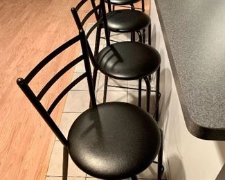 Item 116:  (5) Black metal and leather barstools - Italian: $395                                                                                                                             Barstools - 16"l x 16"w x 43"h & seat height - 29.5"