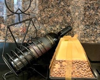 Item 134:  Cool coffee bean candle and wine rack for one bottle (bottle not included!): $15                                                                             Wine rack - 16.25"