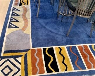 Item 89:  Contemporary Rug, blue interior and abstract border -  some condition issues: 130" x 95": $150