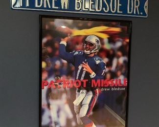 Item 182:  Patriots framed poster of Drew Bledsoe - 24" x 36": $45                                                                                                               Item 183:  Drew Bledsoe Street Sign - 36" x 6": $20 (SOLD)