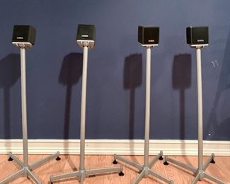 Item 103:  (4) Cambridge Soundworks Center Surround 4 speakers & stands:  $125 for set