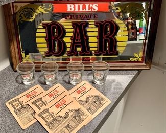 Item 101:  Bill's bar sign, shot glasses, and coasters:                     Sign - 17.25" x 9.25": $22