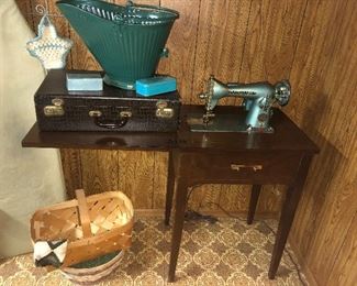 Sovereign sewing machine with table, metal coal bucket, alligator vintage suitcase