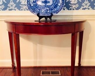 One of an identical pair of demilune tables