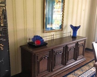 Sideboard with 2 cabinets (left side - 4 drawers, right side 1 shelf), framed print, Chihully glass, and signed blue 2-color glass vase