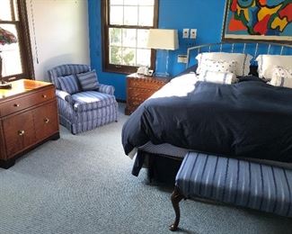 Mid-century Modern side chest with cabinet, armchair, nightstand, and another view of King bed and bench