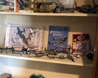 Cast aluminum planes and cars, and models in boxes to build