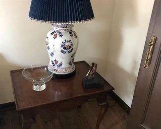 side table with ceramic lamp and Steuben bowl