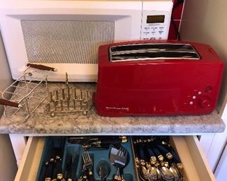 Flatware sets, toaster oven and microwave, trivets and more