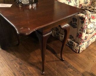 Game table that folds in the middle turning into a sofa/console table or entry way table - great space saving piece - dual purpose