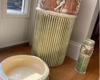 Roseville Donatello Stand/umbrella stand, $325; Console Shallow bowl, $65tall slim vase, $45