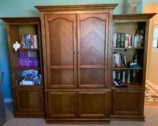 #19	Center entertainment armoire 42"x21"x75" $50 individually. Side cabinets 25.5"x17"x70" 2@$50 each individually. Or three piece set $100 	