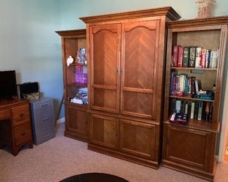 #19	Center entertainment armoire 42"x21"x75" $50 individually. Side cabinets 25.5"x17"x70" 2@$50 each individually. Or three piece set $100 	