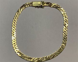 18k Gold 7in Flat Curb Bracelet		
