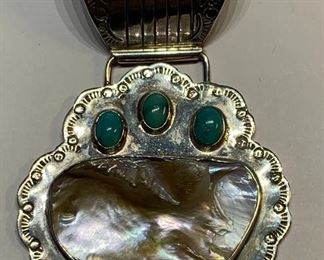 Sterling silver shell and turquoise pendant signed Yates		