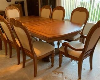 Traditional Carved Hardwood Dining Table w/ 8 Chairs	Table: 30x44x72 (also has Two 15in Leaves)	HxWxD
